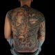 Custom full back tattoo created at OM Tattoo Studio in North Bali, part of the Tattoo Holiday Bali experience