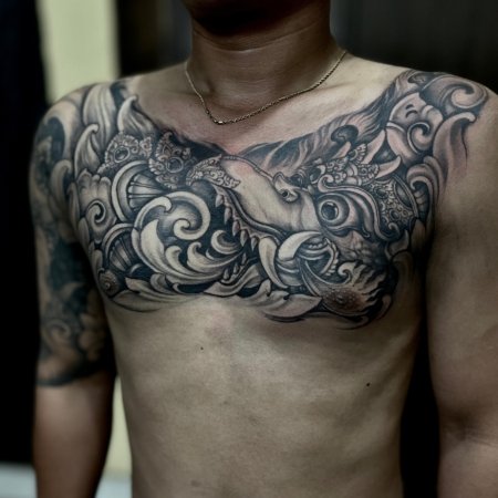 Custom full front torso tattoo created at OM Tattoo Studio in North Bali, part of the Tattoo Holiday Bali experience