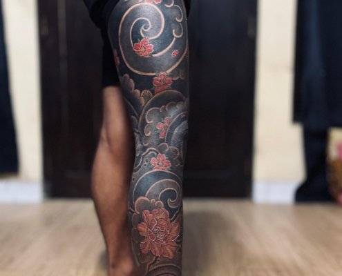 Custom full leg tattoo created at Om Tattoo Studio in North Bali, part of the Tattoo Holiday Bali experience