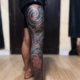 Custom full leg tattoo created at Om Tattoo Studio in North Bali, part of the Tattoo Holiday Bali experience