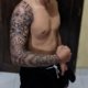 Custom full sleeve tattoo created at Om Tattoo Studio in North Bali, part of the Tattoo Holiday Bali experience