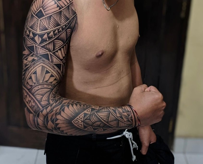 Full Sleeve Tattoo in Bali Custom full sleeve tattoo created at Om Tattoo Studio in North Bali, part of the Tattoo Holiday Bali experience