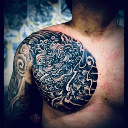 Custom half front torso tattoo created at OM Tattoo Studio in North Bali, part of the Tattoo Holiday Bali experience
