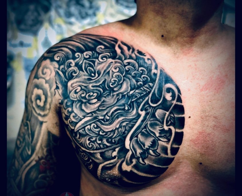 Custom Half Front Torso Tattoo Bali Custom half front torso tattoo created at OM Tattoo Studio in North Bali, part of the Tattoo Holiday Bali experience